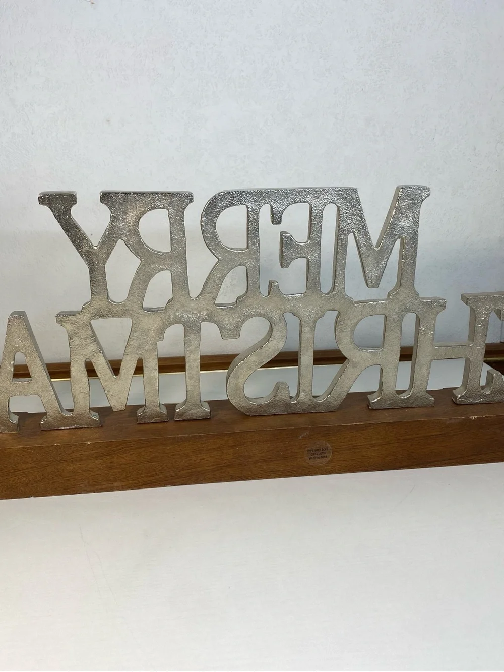 Merry Christmas stocking holder with a wooden stand